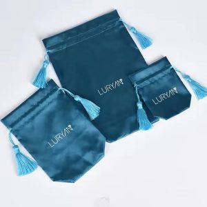 Satin pouch with elegant tassels for jewelry gift